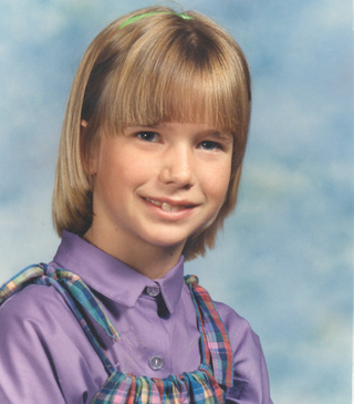 Illustration for article titled Goofy Glasses, Pretty Pigtails & Snaggletooth Smiles: September Is For School Portraits